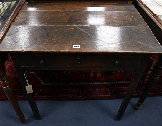 A George III oak lowboy, W.76cm